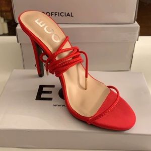 Red single strap shoe